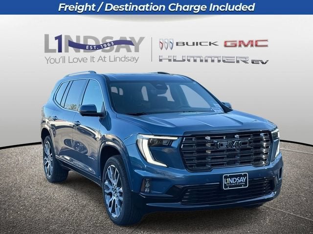 2026 GMC Acadia Denali Ultimate in Downpour Metallic — front three-quarter view