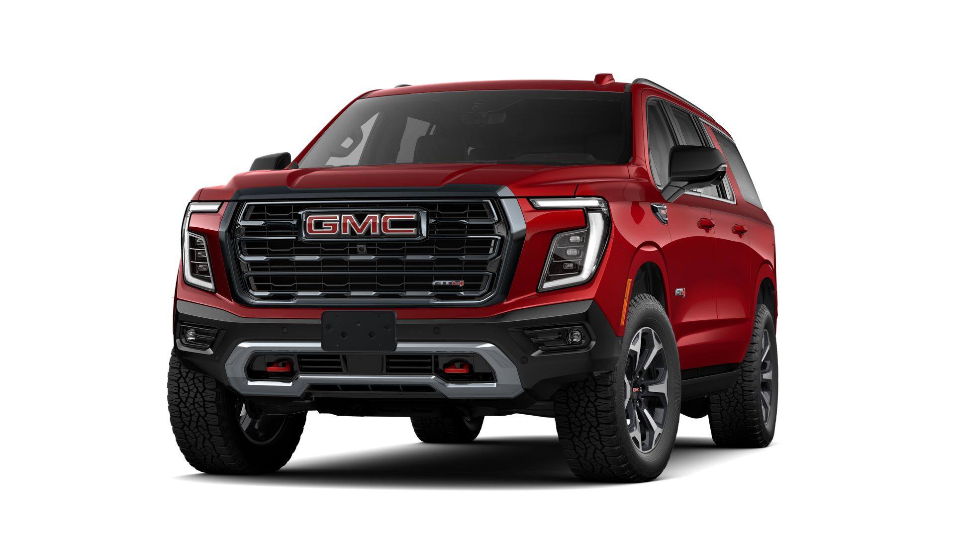 2026 GMC Yukon XL AT4 in Volcanic Red Tintcoat — front three-quarter view
