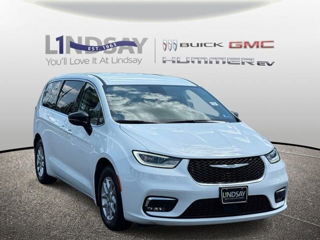 2024 Chrysler Pacifica Touring L in White — front three-quarter view