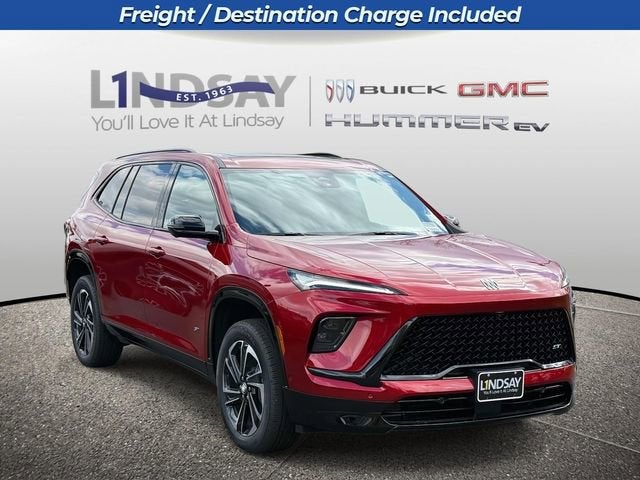 2026 Buick Enclave Sport Touring in Cherry Red Tintcoat — front three-quarter view
