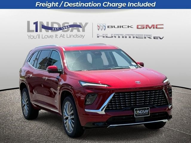 2026 Buick Enclave Avenir in Cherry Red Tintcoat — front three-quarter view